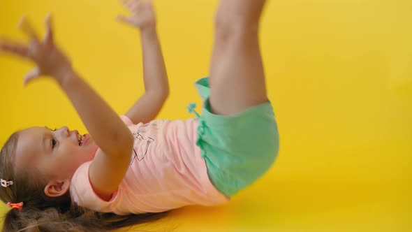Authentic Cute Smiling Preschool Little Girl with Classic Black and White Soccer Ball Look at Camera alt