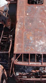 Vertical Video of a Dump of Destroyed Cars During the War in Ukraine alt
