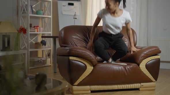 Wide Shot of Home Office with Cheerful African American Young Woman Entering Opening Laptop Checking alt