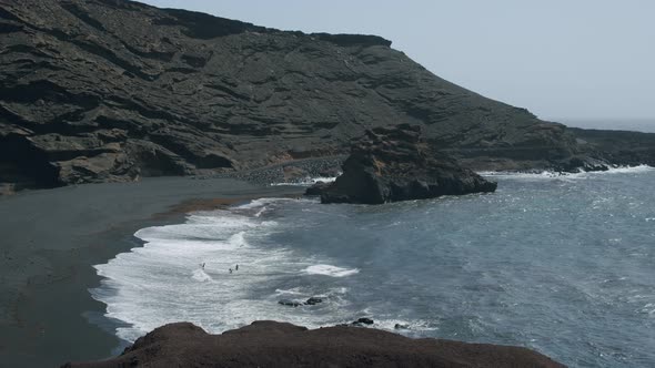 A rocky bay surf in Canarias alt