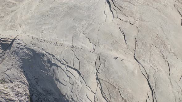 Column of Tourists on They Way Along the Cable Trail on the Slope of Half Dome.Yosemite Park, USA alt