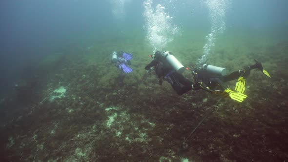 Scuba Divers Underwater alt