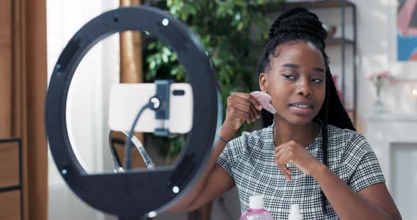 Beauty Influencer Hosts a Live Streaming Channel with Skin Care Tricks alt