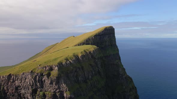 Drone Of Grass Peak Of High Sea Cliff Beinisvord, Stock Footage | VideoHive