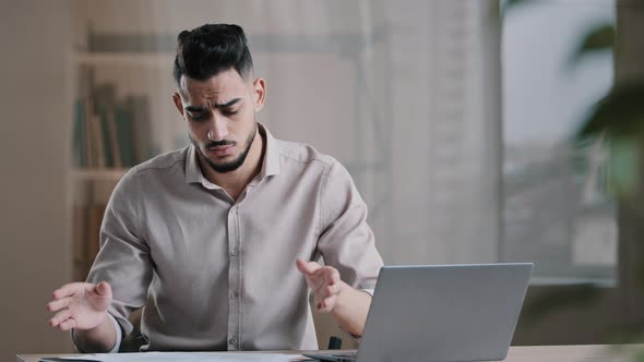 Desperate Stressful Arabic Hispanic Businessman Male Bookkeeper Financial Analyst Read Debt Document alt