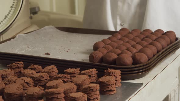 Making chocolate truffles in a candy factory