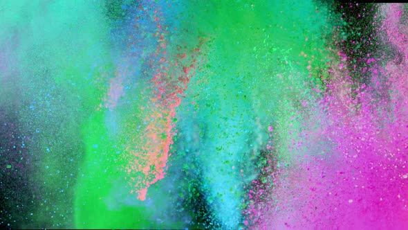 Super Slowmotion Shot of Color Powder Explosions Isolated on Black Background at 1000Fps alt