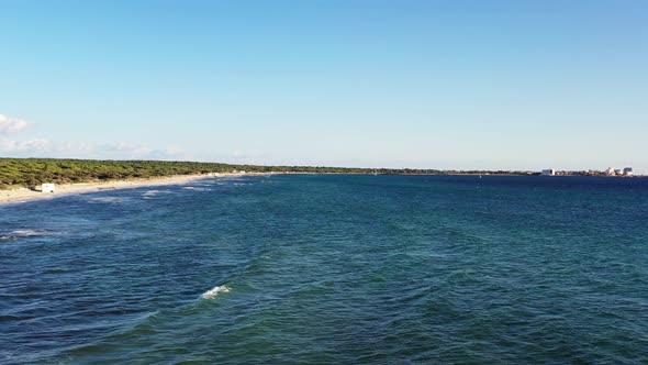 Trenc and Estanys Beaches in Mallorca Spain near Coto Point resort area, Aerial low approach shot alt