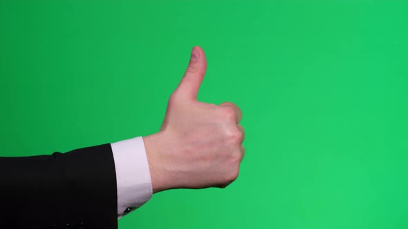 Business Man Hand Showing Thumb Up on Chromakey Screen alt