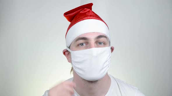 Swag Santa Claus in Protective Medical Mask in Funny Pixelated Sunglasses on White Background alt