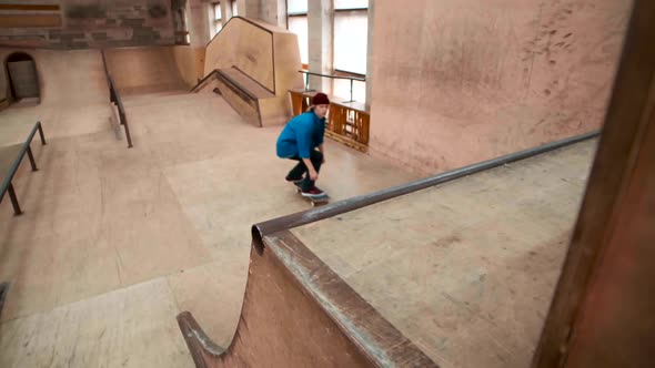 Skater Boy Enjoying Training in Skate Park alt