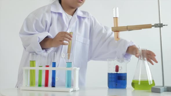 Children play and learn chemical in laboratory