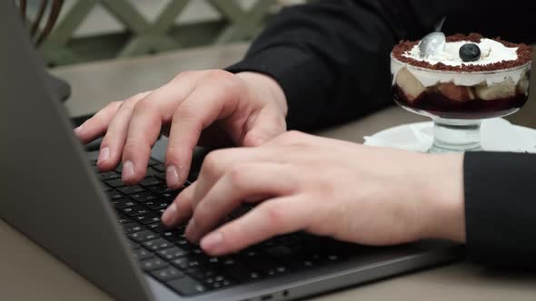 Working on a Laptop Close Up alt