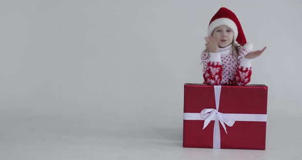 Affectionate Kid Sending Air Kisses at Xmas.