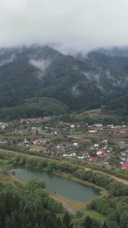 Vertical Video Village in the Carpathian Mountains in Autumn alt