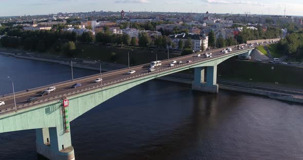 Cars Traffic Over the Bridge Across the River alt