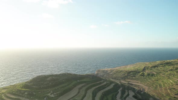 AERIAL: Panoramic Shot of Mediterranean Sea Washing Coastline in Malta