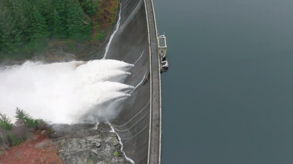 Water Pumped Through a Gravity Fed Hydroelectric Power Station Dam alt