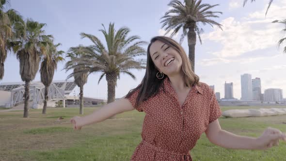 Caucasian Happy Girl are Dancing Outdoors in the City Street Having Fun alt