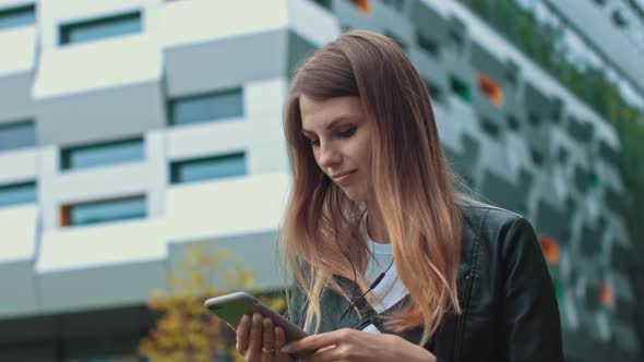 Close Up of Young Girl Woman Attractive Smiling Young Woman in Modern Leather alt
