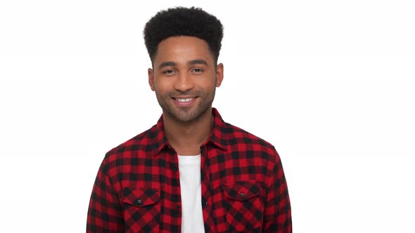 Portrait of Happy Glad Darkskinned Guy in Red Plaid Shirt Looking on Camera Smiling Broadly with alt