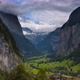 4K Timelapse of clouds moving amongst mountains in Lauterbrunnen Village, Switzerland - VideoHive Item for Sale