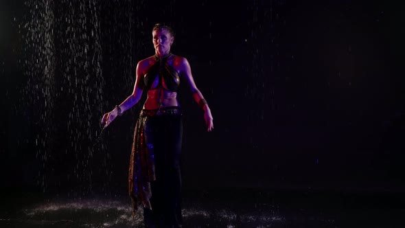 Amazing Belly Dance Under Rain in Darkness Young Sexy Woman is Dancing Alone Female Silhouette alt