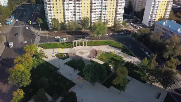 Cityscape From Drone in Sunny Autumn Day, Park Area with Resting Citizens