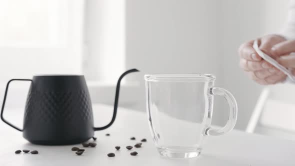 Making Brewed Coffee and Filtering It with Drip Coffee Bag alt