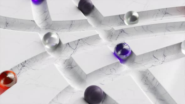 Colored Balls Roll Around the White Marble Labyrinth alt