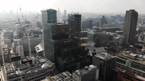 Aerial view of Citypoint and Barbican estate on a sunny hazy day in London alt