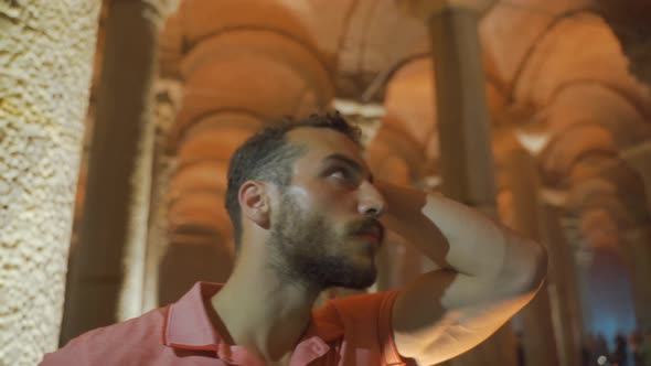 Nervous and fearful person indoors. alt