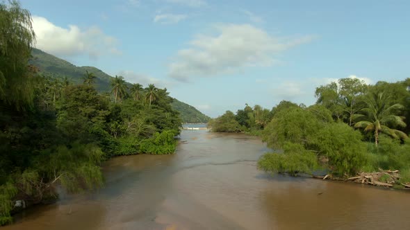 Aerial View Of River Flowing In Forest, Yelapa, Jalisco, Mexico - drone shot alt