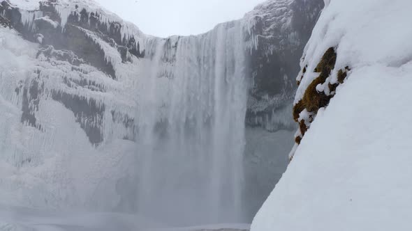 Revealing The Large Skogafoss Waterfall In Iceland During Winter 