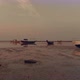 Drone Flight Between Boats in Sunset Low Tide - VideoHive Item for Sale