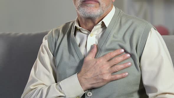 Senior Man Suddenly Feeling Pain in Chest, Cardiological Problem, Heart Attack alt