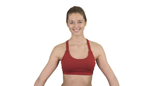Young attractive woman practicing yoga sitting in Gomukasana alt