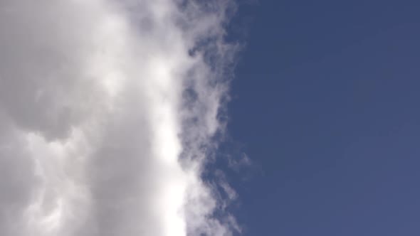 Huge White Clouds On A Beautiful Blue Sky, Crane Shot alt