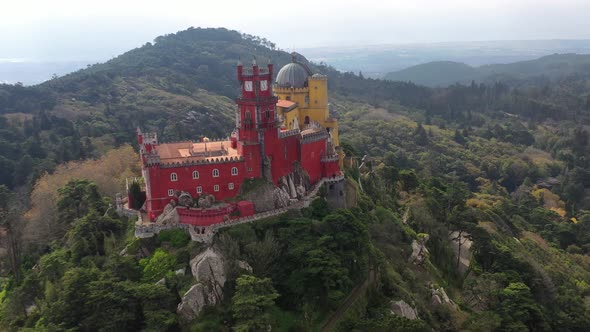 Aerial view of Pena Palace, a castle in Sintra, Lisbon, Portugal. alt