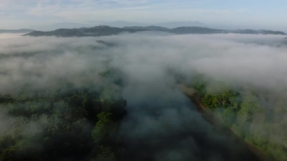 Aerial Drone View of Rainforest River Landscape with Costa Rica Mountains, Beautiful Misty Tropical alt