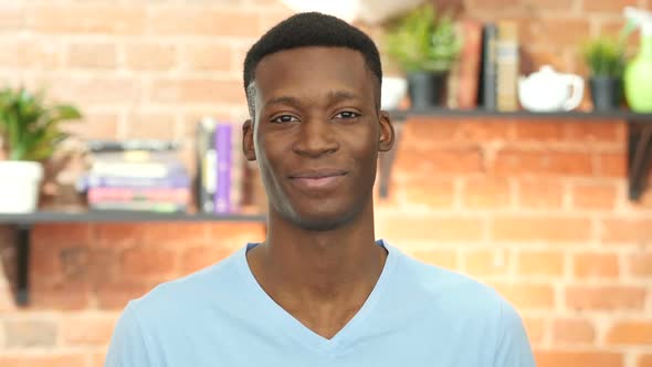 Black Young Man Saying Yes, by Shaking Head alt