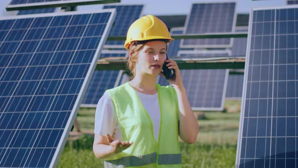 Good Looking Engineer Woman at Photovoltaic Solar