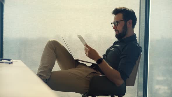 Successful Leader Problem Solving  In Office. Businessman Read Investor Report Briefing Document. alt