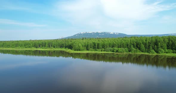 Beautiful Landscape of a Mountain Lake and a Ridge on the Horizon