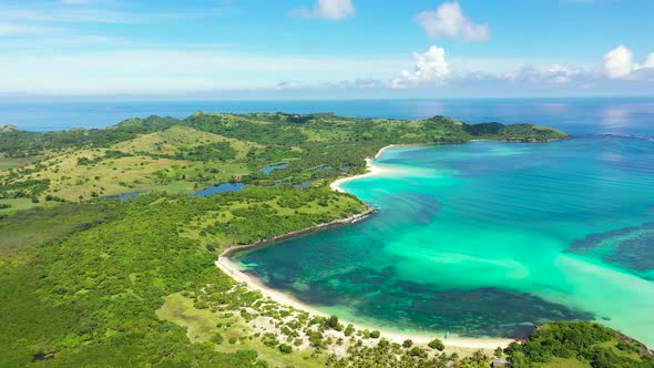 A Tropical Island with a Turquoise Lagoon and a Sandbank. Caramoan Islands, Philippines. alt