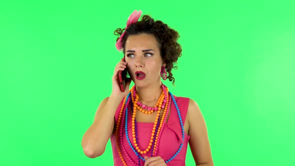 Girl Talking for Mobile Phone, Very Shocked and Rejoices alt