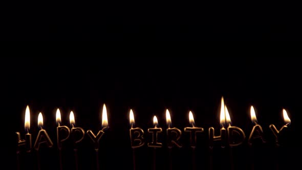 Letter Candles Happy Birthday Lighting and Then Blown Off in Darkness