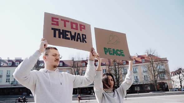 People Holding Posters Calling to Stop the War in Ukraine