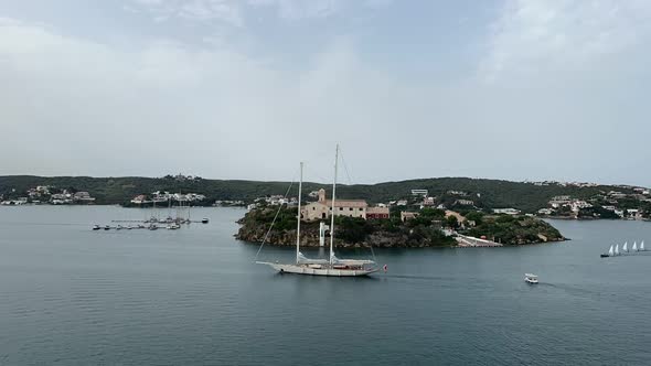 Timelapse of the King’s island, in Menorca, Spain, a great natural  bay, with many sailboats, in a r alt