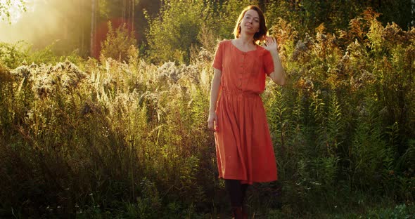 Happy Girl Linen Dress Enjoying Natural Sunset Light Outdoors Nature Background